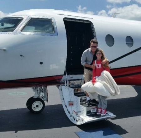 Charlie Sheen on his private jet with his daughter Sami Sheen.